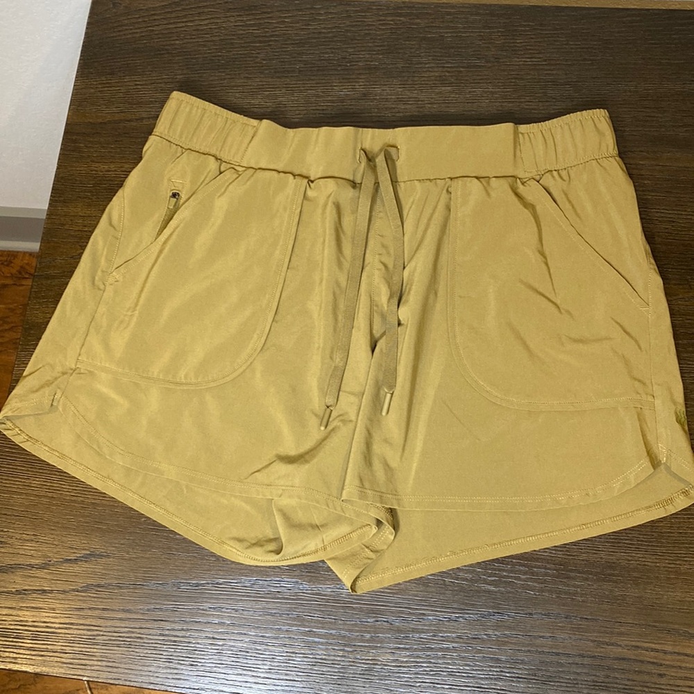 All in motion light olive woven stretch shorts.